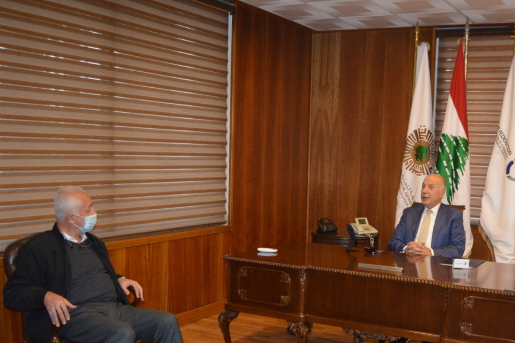الرئيس دبوسي والأستاذ غسان حسامي